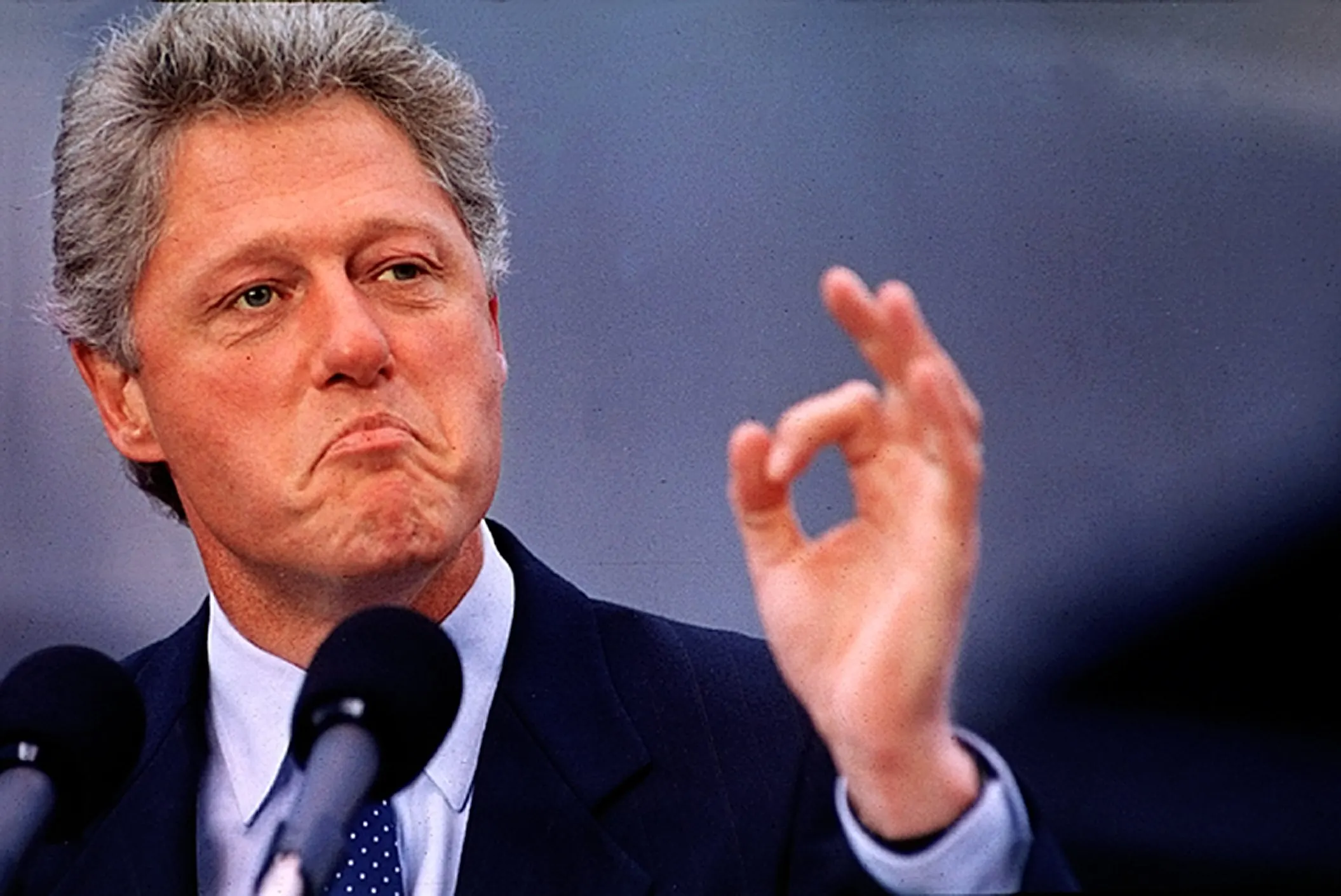 Slick Willie — Democratic presidential candidate Bill Clinton gestures to supporters during a rally, Tuesday, September 29, 1992 in Louisville, Kentucky. Clinton made the Louisville stop to draw attention to the second scrapped presidential debate between him and President George Herbert Walker Bush. Clinton was there to make clear he is ready and available for their meeting.  (AP Photo/Stephan Savoia)  © The Associated Press