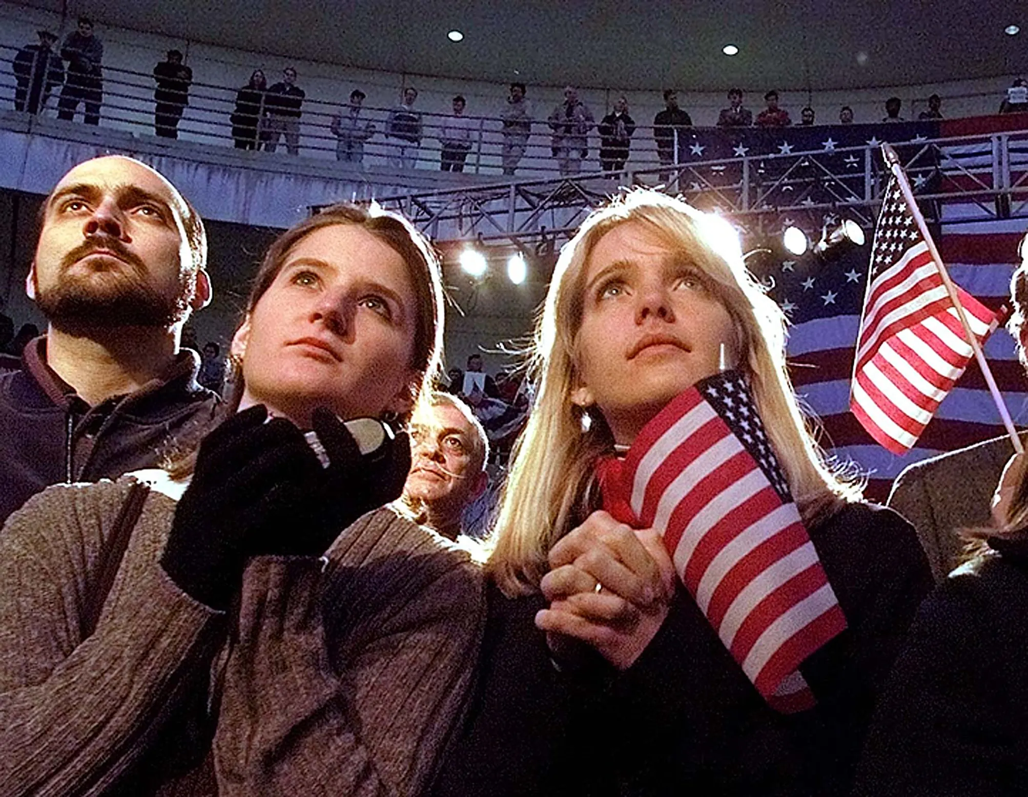 Mesmerized Voters — Lauren McLaughlin, right, and Sarah Camp, both juniors at the University of South Carolina, listen as Republican presidential candidate Senator John McCain, Arizona, addresses supporters at a McCain 2000 campaign rally on the University of South Carolina campus in Columbia, South Carolina on Wednesday, February 2, 2000. McCain, who won New Hampshire's first presidential primary in a landslide on Tuesday, is campaigning in South Carolina.  (AP Photo/Stephan Savoia)  © The Associated Press